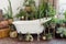 Bathroom with bathtub and green plants