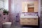 Bathroom design. The bathroom is lined with purple tiles. The room has a wooden cabinet, a mirror and a toilet.