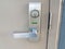 Bathroom door handle with green vacant sign