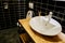 Bathroom Interior with Design Washbasin and Toilet