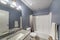 Bathroom interior with lights and purple gray wall paint