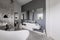 Bathroom interior with trendy grey design with white furniture