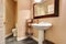 Bathroom interior with white washbasin stand