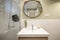 Bathroom with large sink in a piece of white earthenware