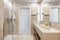 Bathroom with one-piece sink with two sinks in cream-colored