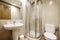 Bathroom with porcelain pedestal sink and recessed rectangular mirror