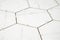 Bathroom renovation - ceramic hexagonal tile laying. Interior finishing works