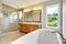 Bathroon with vanity cabinet and shower area with glass doors