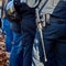 Baton on the belt of a German policeman in black uniform