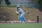 Batsman hitting cricket ball