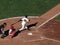 Batter Edgar Renteria swing and misses pitch