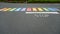 Battered gay-themed rainbow color crosswalk
