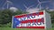 Battery container with flag of Puerto Rico and ENERGY STORAGE text at wind turbines. Ecological electric power concept