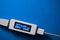 Battery tester diagnostic tool, blue background