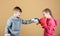 Battle for attention. Child sporty athlete practicing boxing skills. Boxing sport. Children wear boxing gloves while