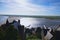 Battle between water and land. High tide near ancient Mont Saint-Michel abbey. View from walls of the Mont Saint-Michel