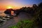 Batu bolong temple in tanah lot bali with beautiful sunset