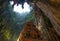 Batu Caves Kuala Lumpur Malaysia, scenic interior limestone cavern decorated with temples and Hindu shrines, travel destination in