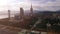 Batumi downtown in light haze against mountain skyline, early evening in city