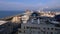 Batumi, Panoramic view from a tall multi-storey building. Various buildings, roofs, houses, embankment by the Black Sea.