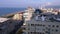 Batumi, Panoramic view from a tall multi-storey building. Various buildings, roofs, houses, embankment by the Black Sea.