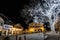 Bauernhaus style Bavarian buildings at night with Christmas lights