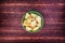 Baursak - traditional Kazakh Asia food national bread in plate on wooden background. Top view