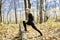 A Bautiful running woman jogging in autumn nature