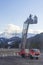 BAVARIA, Germany- April 23, 2018:Technicians on the bucket of truck high up of a crane and discussing.Behind it the