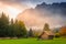 Bavarian alps autumn and wooden barn at sunset, Garmisch Partenkirchen, Germany