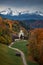 Bavarian Alps with church of Wamberg in Garmisch-Partenkirchen during autumn