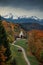 Bavarian Alps with church of Wamberg in Garmisch-Partenkirchen during autumn