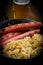 Bavarian fried sausages on sauerkraut