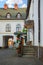 Bavarian monastery courtyard outside exterior landscaping environment space with clean street and flowers near entrance door