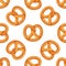 Bavarian pretzel seamless pattern on isolated background. Vector cartoon illustration.