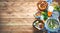 Bavarian sausages with pretzels, sweet mustard and beer on rustic wooden table