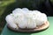 Bavarian specialty white radish sliced on wooden board