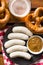 The bavarian weisswurst, pretzel and mustard.