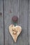 Bavarian wooden heart with hello text in german letters.