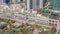 Bay Avenue Park near modern residential and office complex aerial timelapse at Business Bay