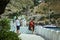 The Bay of Balaklava and the Ruins of Genoese fortress Cembalo. Balaklava, Crimea. People admire the sea