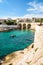 Bay and bridge of La Fausse Monnaie on a sunny day in Marseille, France