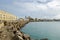 Bay of Cadiz with its waterfront promenade Avenida Campo del Sur and the Cadiz Cathedral