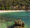 Bay near Lubenice with rock in foreground on a sunny day in spring