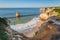 Bay on the ocean with beautiful blue waves. Portugal.