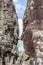 Bayon stone face tower in Angkor Wat, Siem Reap, Cambodia.