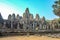 Bayon Temple siem reap with blue sky and tourist visit angkor wat