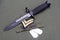 bayonet with dog tags on US ARMY uniform background