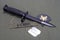 bayonet with dog tags on US ARMY uniform background