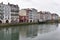 BAYONNE, FRANCE - Old houses by the river La Nive in the center of Bayonne, Aquitaine, France